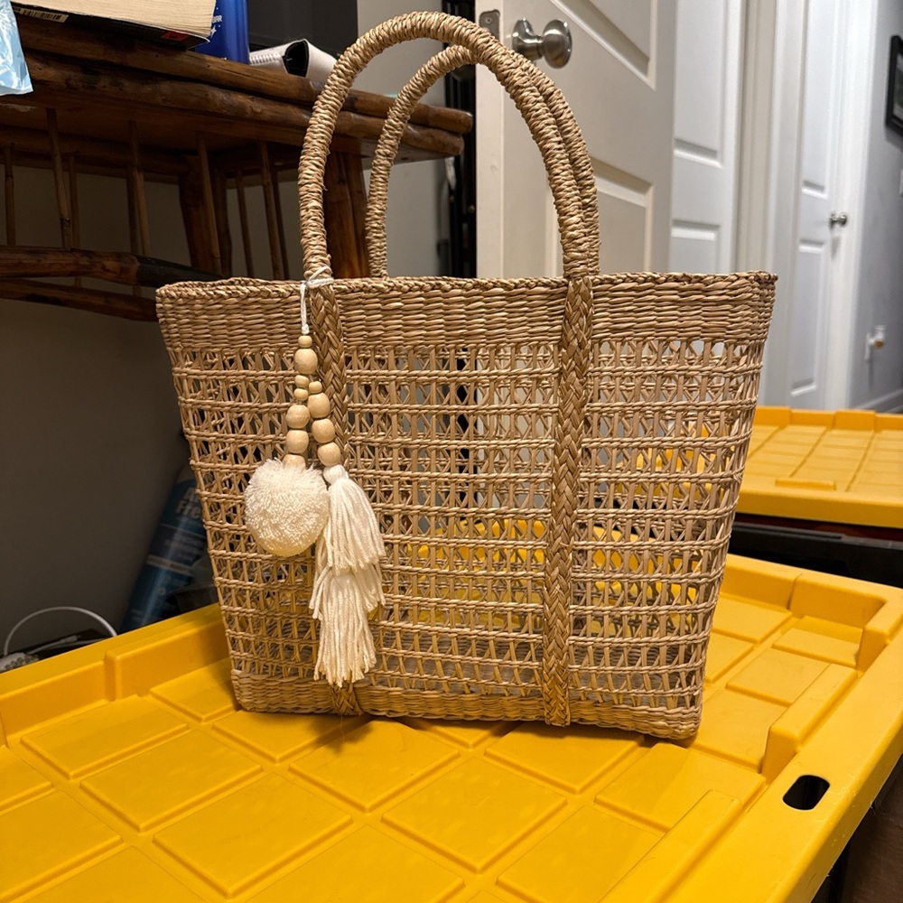 Woven Tan Tote Bag with Tassel Charm